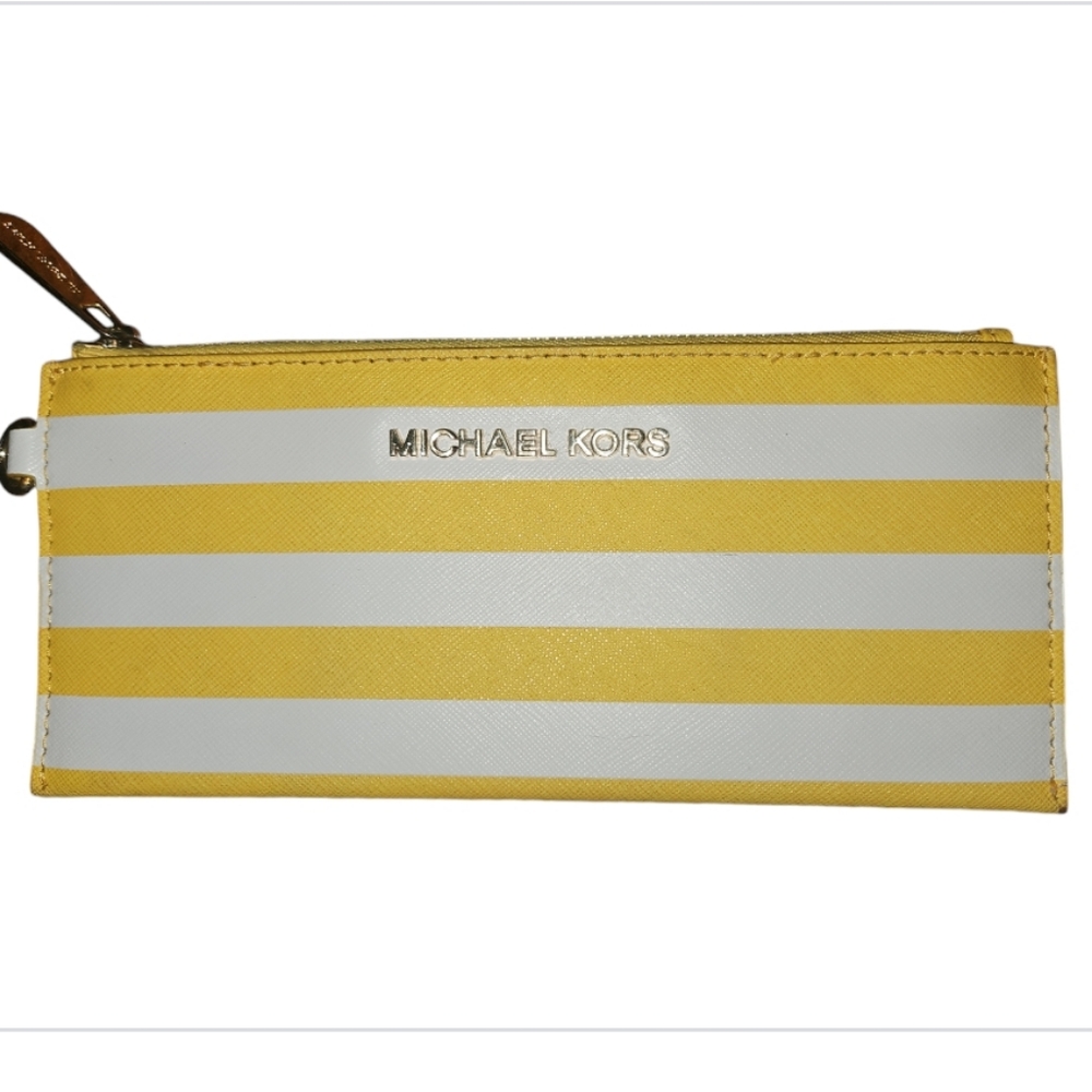 Michael Kors wristlet strap is missing. EUC 8.5x4.5" Yellow and white striped